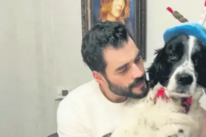 Köpeğinin doğum gününü kutladı